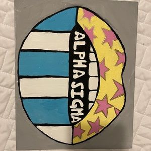 Painted “Alpha Sigma” sign